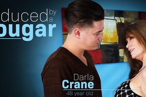 American MILF Darla Crane seduces a young man to fuck her wild at her house!